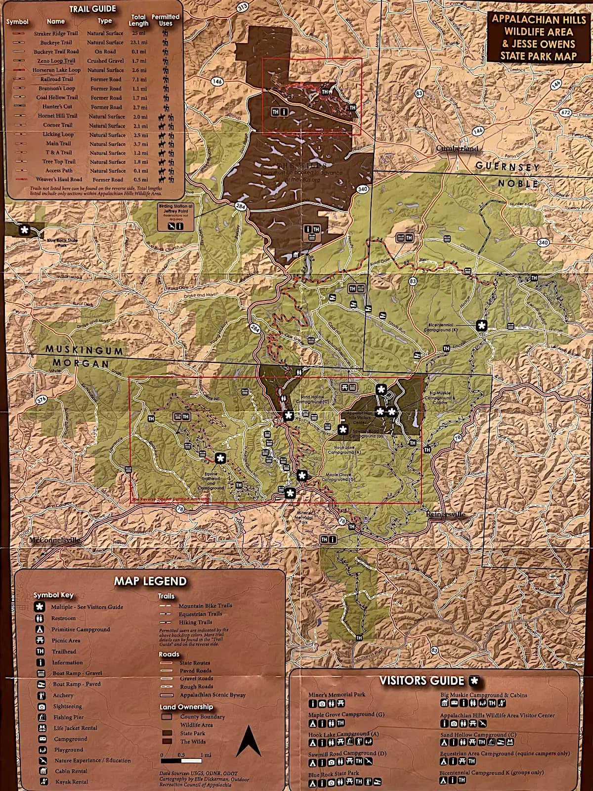 Official Appalachian Hills Wildlife Area and Jesse Owens State Park Visitors Guide and Regional Map showing trail routes, Miner's Memorial Park, campgrounds, kayak launch points, and land ownership across Morgan and Muskingum Counties in Ohio