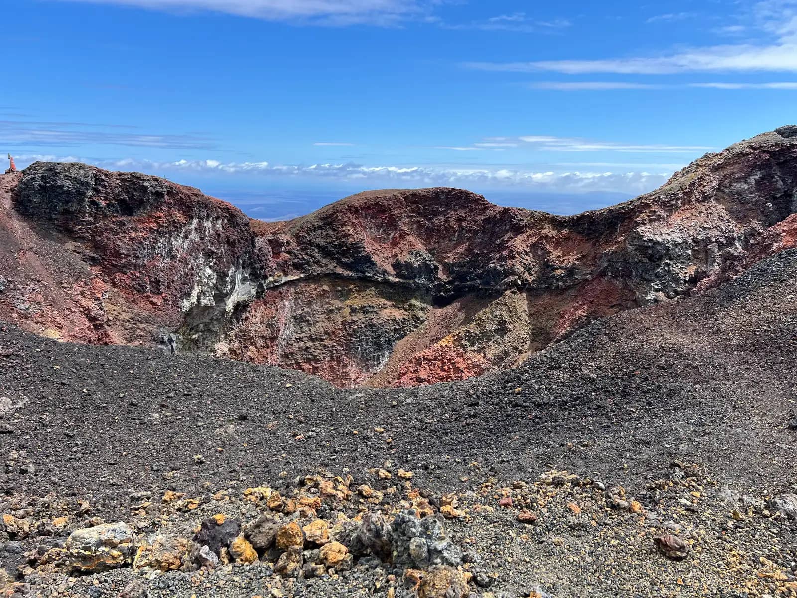 Sierra Negra volcano crater with multicolored volcanic rock formations and expansive caldera view Isabela Island Galapagos Islands Ecuador